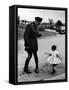 Canadian Mountie is Taken Off Guard by Little Girl Rushing to See Visiting Queen Elizabeth-Alfred Eisenstaedt-Framed Stretched Canvas