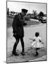 Canadian Mountie is Taken Off Guard by Little Girl Rushing to See Visiting Queen Elizabeth-Alfred Eisenstaedt-Mounted Photographic Print