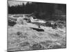 Canadian Woodsman Robert Rock, Falling Out of the Canoe as He Tries a Set Rapids-null-Mounted Photographic Print