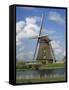 Canal and Windmill at Kinderdijk, Unesco World Heritage Site, Holland-Gavin Hellier-Framed Stretched Canvas