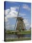 Canal and Windmill at Kinderdijk, Unesco World Heritage Site, Holland-Gavin Hellier-Stretched Canvas