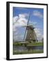 Canal and Windmill at Kinderdijk, Unesco World Heritage Site, Holland-Gavin Hellier-Framed Photographic Print