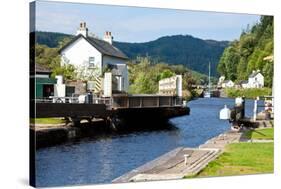 Canal Lock at Cairnbaan Bridge on the Crinan Canal in Scotland-naumoid-Stretched Canvas