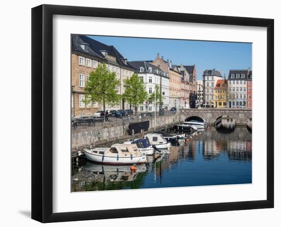 Canal under the Strombroen (Storm Bridge) with colourful houses in the old town, Copenhagen-Jean Brooks-Framed Photographic Print