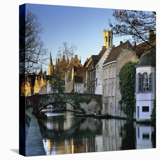 Canal View with Belfry in Winter, Bruges, West Vlaanderen (Flanders), Belgium, Europe-Stuart Black-Stretched Canvas