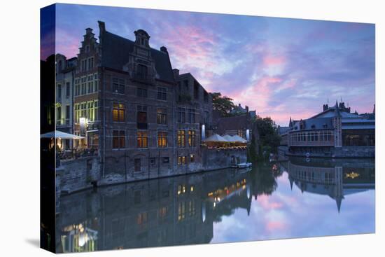 Canalside cafes on Leie Canal at sunset, Ghent, Flanders, Belgium, Europe-Ian Trower-Stretched Canvas