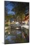 Canalside restaurant at dusk, Lijiang, UNESCO World Heritage Site, Yunnan, China, Asia-Ian Trower-Mounted Photographic Print