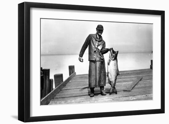 Cannery Worker with Salmon, Circa 1909-Asahel Curtis-Framed Giclee Print