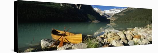 Canoe at the Lakeside, Lake Louise, Banff National Park, Alberta, Canada-null-Stretched Canvas