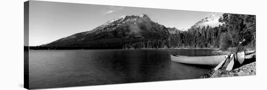 Canoe in Lake in Front of Mountains, Leigh Lake, Rockchuck Peak, Teton Range-null-Stretched Canvas