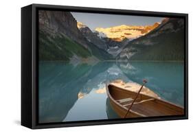 Canoe on Lake Louise at Sunrise-Miles Ertman-Framed Stretched Canvas