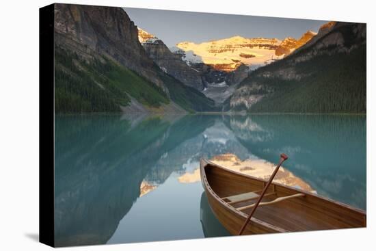 Canoe on Lake Louise at Sunrise-Miles Ertman-Stretched Canvas