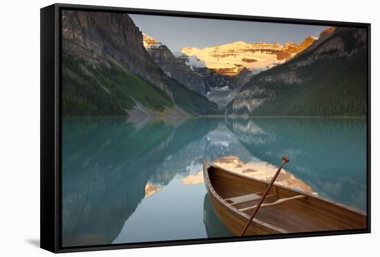 Canoe on Lake Louise at Sunrise-Miles Ertman-Framed Stretched Canvas