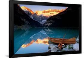 Canoe On Lake Louise-null-Framed Poster