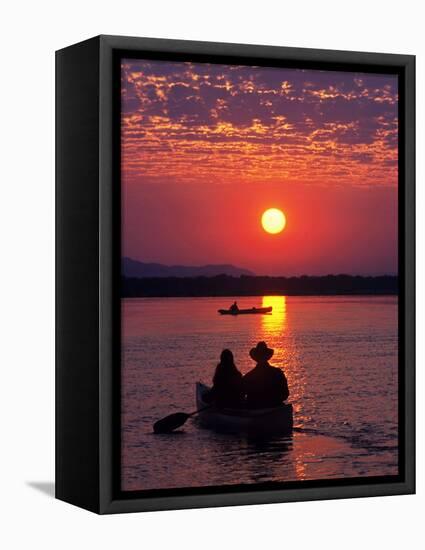 Canoeing at Sun Rise on the Zambezi River-John Warburton-lee-Framed Stretched Canvas