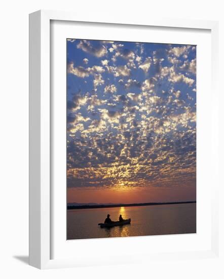 Canoeing under a Mackerel Sky at Dawn on the Zambezi River, Zambia-John Warburton-lee-Framed Photographic Print