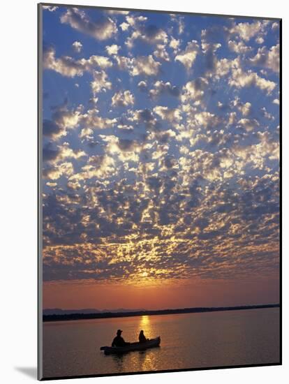 Canoeing under a Mackerel Sky at Dawn on the Zambezi River, Zambia-John Warburton-lee-Mounted Photographic Print