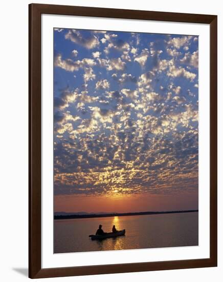 Canoeing under a Mackerel Sky at Dawn on the Zambezi River, Zambia-John Warburton-lee-Framed Photographic Print