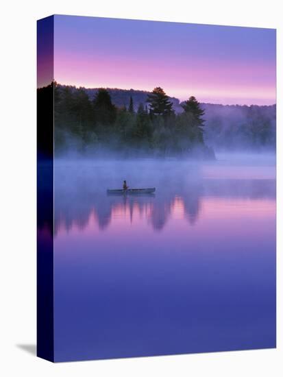 Canoeist on Lake at Sunrise, Algonquin Provincial Park, Ontario, Canada-Nancy Rotenberg-Stretched Canvas