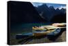 Canoes at Moraine Lake in Banff-W. Perry Conway-Stretched Canvas