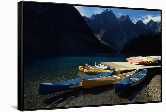 Canoes at Moraine Lake in Banff-W. Perry Conway-Framed Stretched Canvas