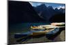 Canoes at Moraine Lake in Banff-W. Perry Conway-Mounted Photographic Print