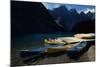 Canoes at Moraine Lake in Banff-W. Perry Conway-Mounted Photographic Print