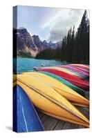 Canoes on a Dock, Moraine Lake, Banff National Park, Canada-George Oze-Stretched Canvas