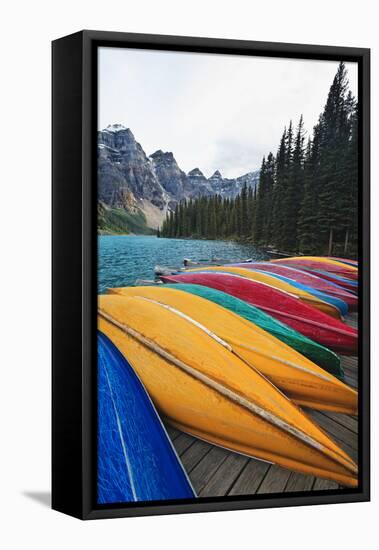 Canoes on a Dock, Moraine Lake, Canada-George Oze-Framed Stretched Canvas
