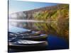 Canoes on a Rural Lake-Darrell Gulin-Stretched Canvas