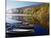 Canoes on a Rural Lake-Darrell Gulin-Stretched Canvas