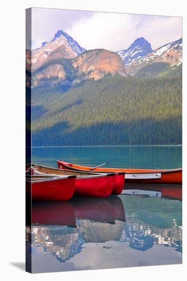 Canoes Turquoise Lake Canada-null-Stretched Canvas