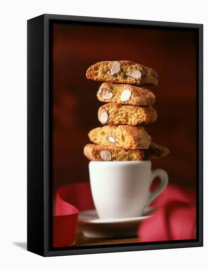 Cantucci Biscuits Piled on a Coffee Cup-Luzia Ellert-Framed Stretched Canvas