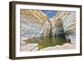 Canyon Ein Avdat in Israel. Sandstone Canyon Walls Form a round Bowl. Thin Jet Waterfall Form Cold-kavram-Framed Photographic Print