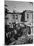 Capital Building Sitting Behind Slum Dwellings in the City-Dmitri Kessel-Mounted Photographic Print