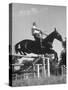 Capt. Theodore Galiza, Russian Riding Master, Taking Triple Bars, Horse Show Organized-Alfred Eisenstaedt-Stretched Canvas