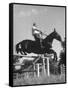 Capt. Theodore Galiza, Russian Riding Master, Taking Triple Bars, Horse Show Organized-Alfred Eisenstaedt-Framed Stretched Canvas