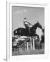 Capt. Theodore Galiza, Russian Riding Master, Taking Triple Bars, Horse Show Organized-Alfred Eisenstaedt-Framed Photographic Print