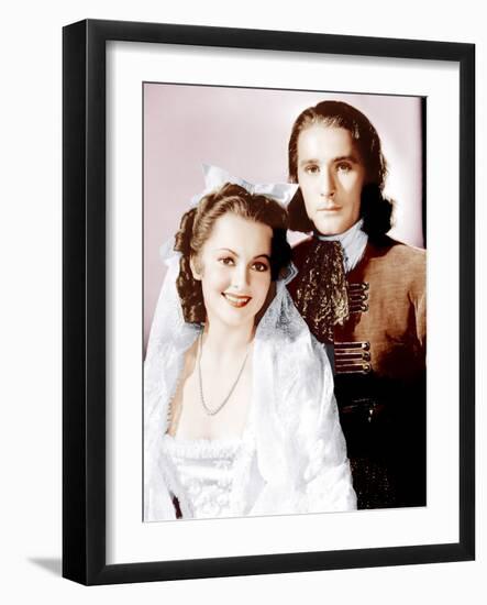 CAPTAIN BLOOD, from left: Olivia de Havilland, Errol Flynn, 1935-null-Framed Photo