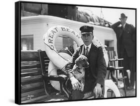 Captain Lane Erickson of the Great Bear with Dog, 1916-Asahel Curtis-Framed Stretched Canvas