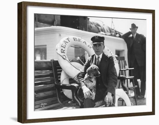 Captain Lane Erickson of the Great Bear with Dog, 1916-Asahel Curtis-Framed Giclee Print