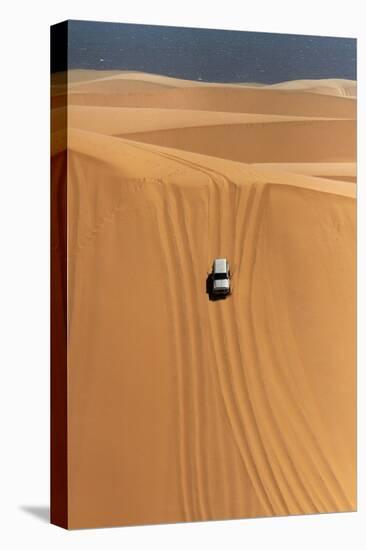 Car Descending a Sand Dune, Namib-Naukluft National Park, Namibia-David Wall-Stretched Canvas