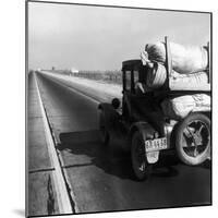 Car Laden with Baggage on Desolate Track of Highway in Desert in Southern California-Dorothea Lange-Mounted Photographic Print