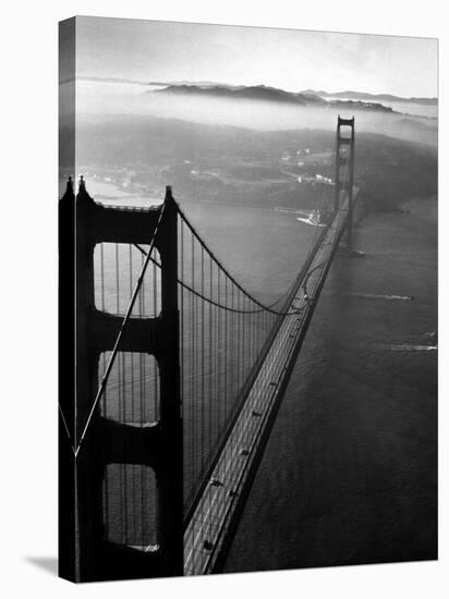 Car Lanes across the Golden Gate Bridge with Fog-Covered City of San Francisco in Background-Margaret Bourke-White-Stretched Canvas