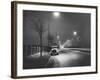 Car on a Lit Road-null-Framed Photographic Print