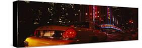 Car on a Road, Radio City Music Hall, Rockefeller Center, Manhattan, New York, USA-null-Stretched Canvas