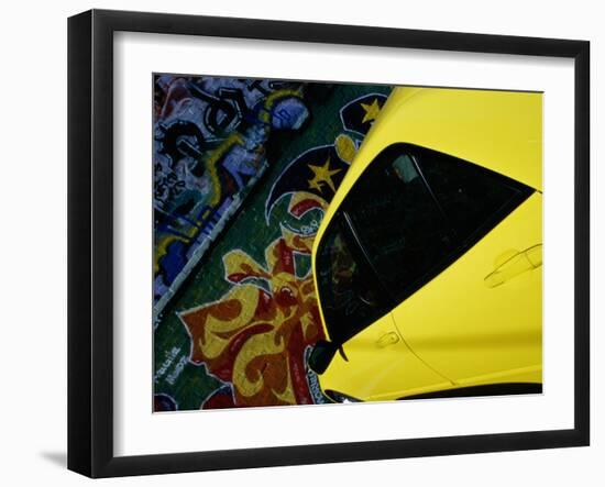 Car Parked by Graffiti Filled Wall-null-Framed Premium Photographic Print