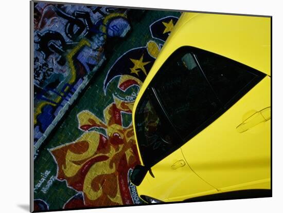 Car Parked by Graffiti Filled Wall-null-Mounted Premium Photographic Print