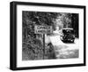 Car Passing 'Danger Landslide' Sign (B&W)-Hulton Archive-Framed Photographic Print