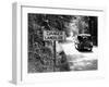 Car Passing 'Danger Landslide' Sign (B&W)-Hulton Archive-Framed Photographic Print